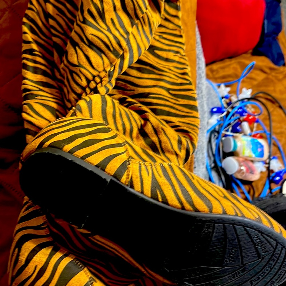 These are tiger, print boots, never been worn